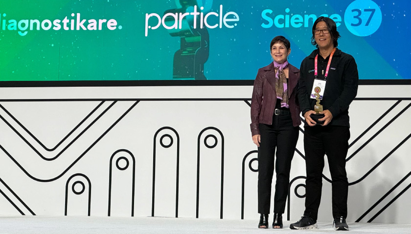 Cleerly's Jim Min accepts the Digital Health Hub Foundation Award for Best Use of AI in Health Tech